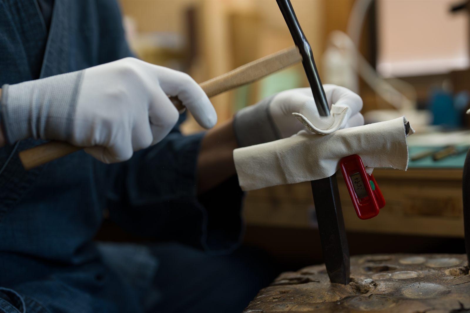 Metalwork with hammer and chisel
